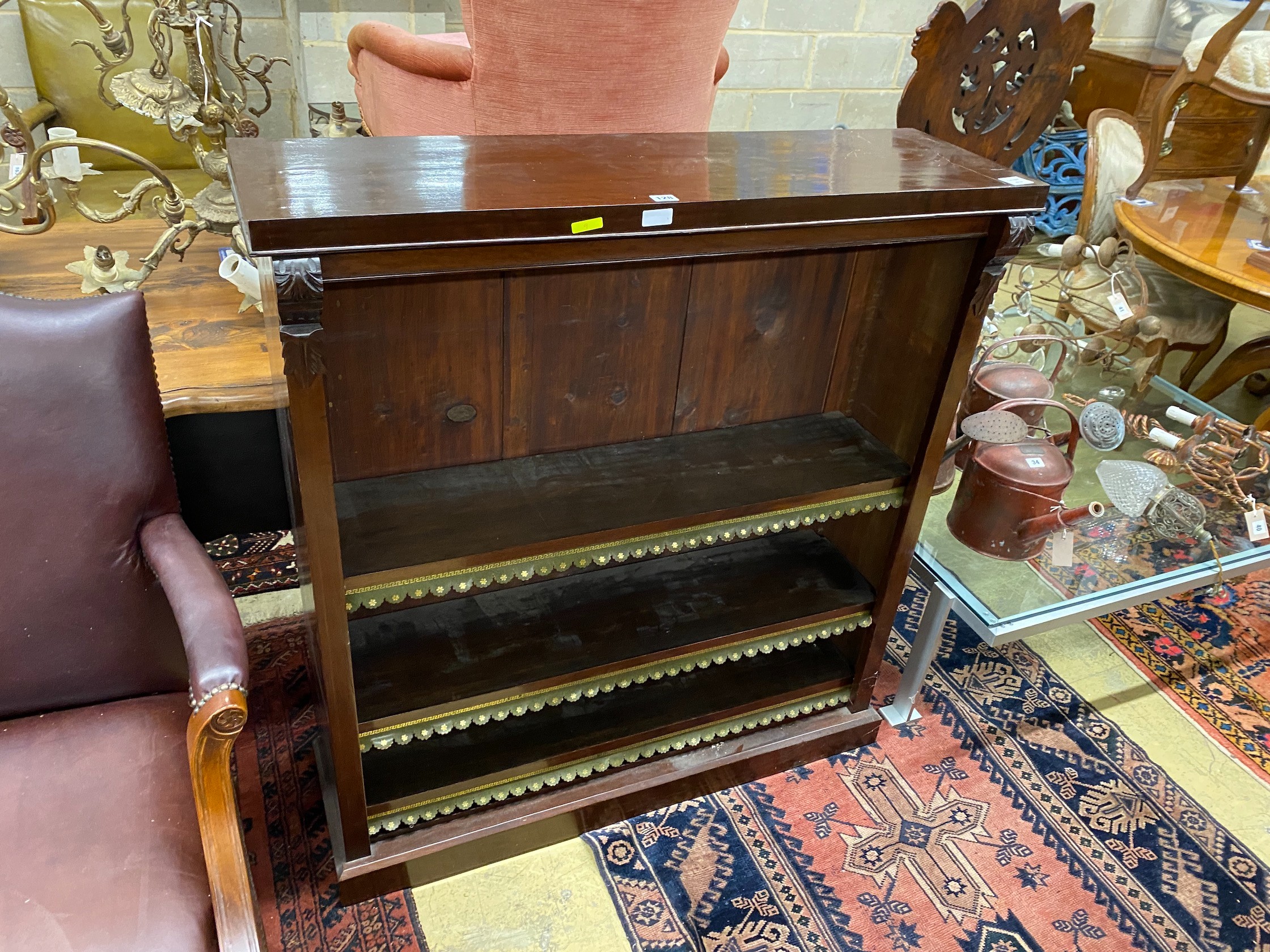 A Victorian mahogany open bookcase with carved acanthus mounts, width 107cm, depth 32cm, height 116cm